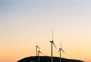 Wind turbines at sunset